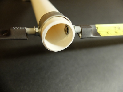 Boom to Element Connection showing Boom strap and plastic 'compression spring'